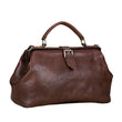 Load image into Gallery viewer, Brown leather handbag on a light wooden surface