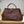 Load image into Gallery viewer, Brown leather handbag on a light wooden surface with a neutral background
