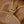 Load image into Gallery viewer, Close-up of a brown leather bag with stitching details
