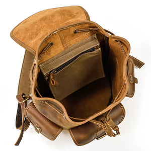 Brown leather backpack on a white background