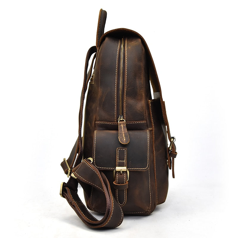 Side View of Brown Leather Backpack